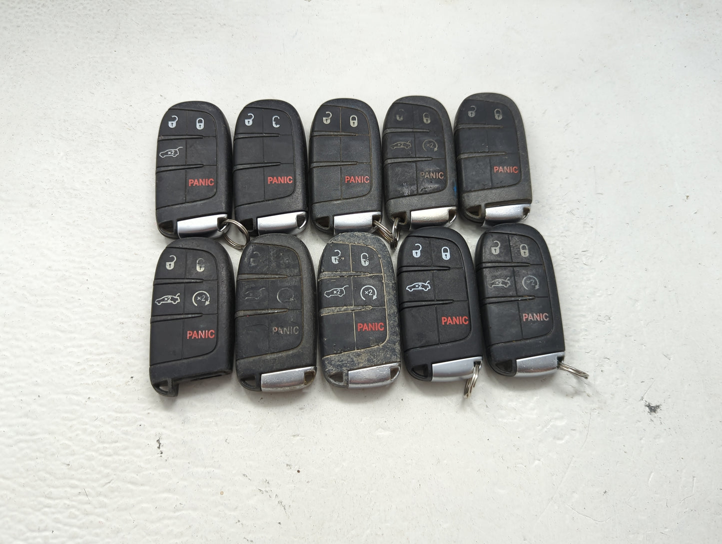 Lot of 10 Dodge Keyless Entry Remote Fob MIXED FCC IDS MIXED PART 1475804 - Oemusedautoparts1.com