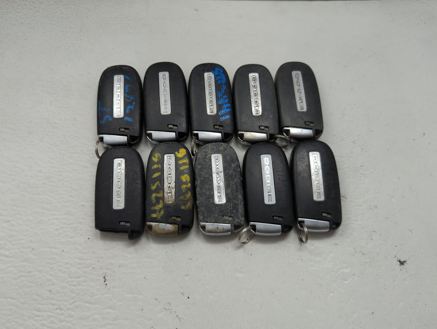 Lot of 10 Dodge Keyless Entry Remote Fob MIXED FCC IDS MIXED PART 1475804 - Oemusedautoparts1.com