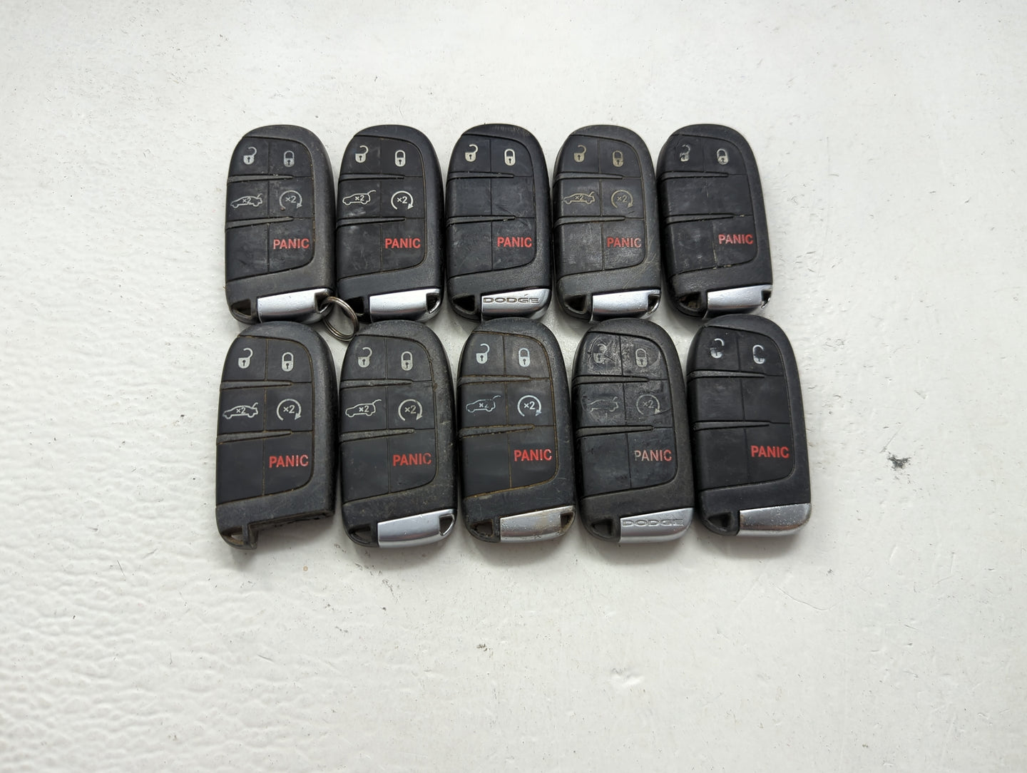 Lot of 10 Dodge Keyless Entry Remote Fob MIXED FCC IDS MIXED PART 1475815 - Oemusedautoparts1.com