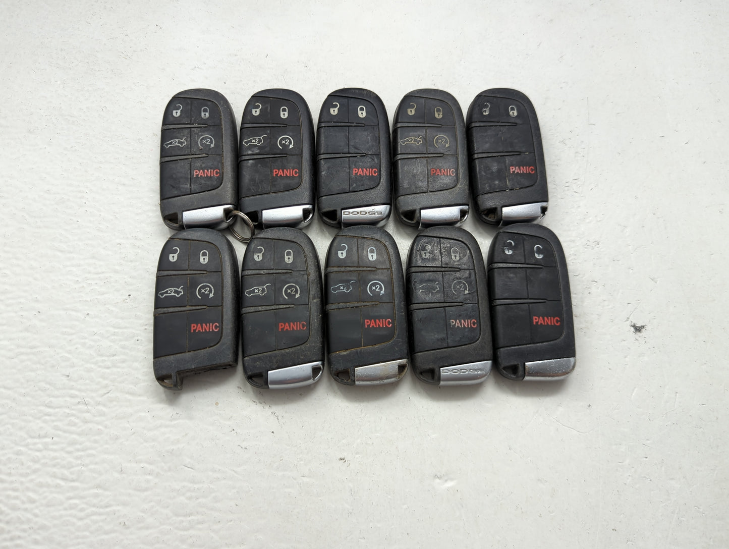 Lot of 10 Dodge Keyless Entry Remote Fob MIXED FCC IDS MIXED PART 1475815 - Oemusedautoparts1.com