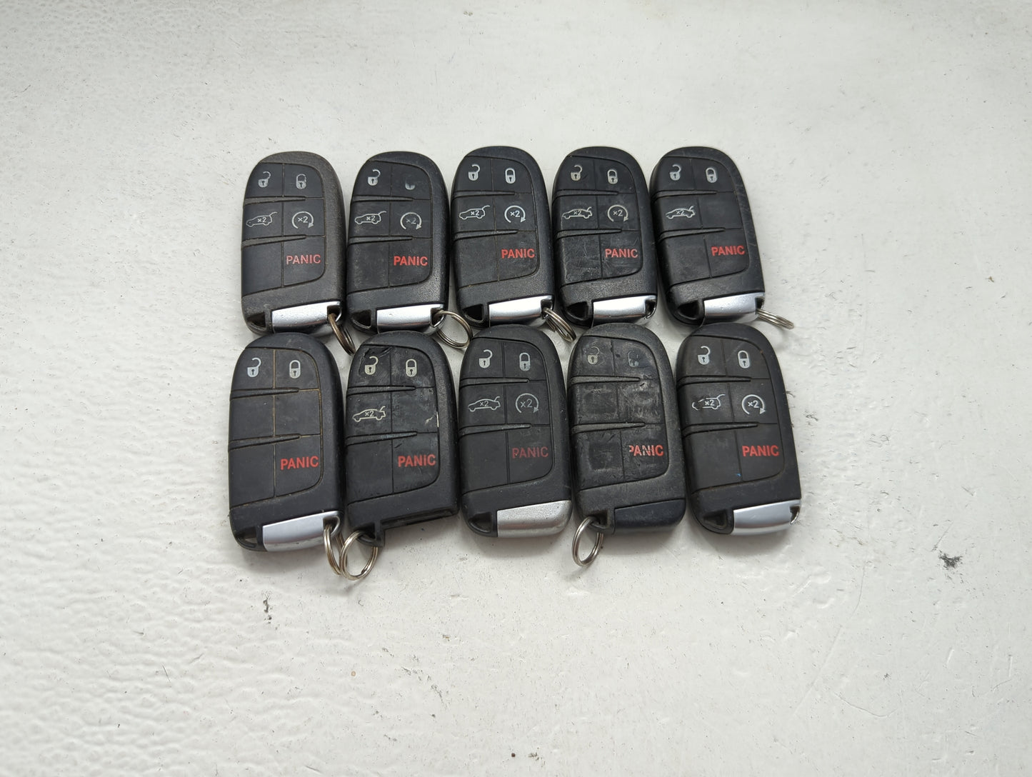 Lot of 10 Dodge Keyless Entry Remote Fob MIXED FCC IDS MIXED PART 1475816 - Oemusedautoparts1.com