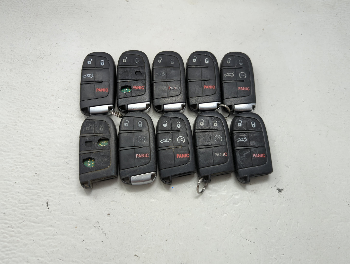 Lot of 10 Dodge Keyless Entry Remote Fob MIXED FCC IDS MIXED PART 1475817 - Oemusedautoparts1.com