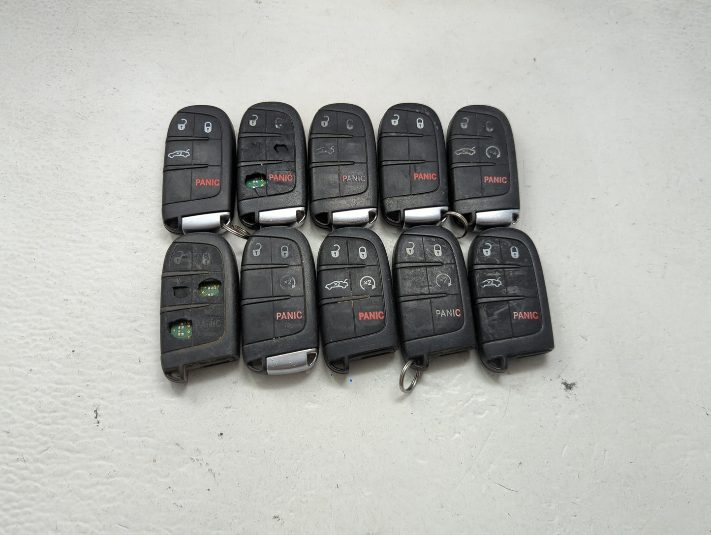 Lot of 10 Dodge Keyless Entry Remote Fob MIXED FCC IDS MIXED PART 1475817 - Oemusedautoparts1.com