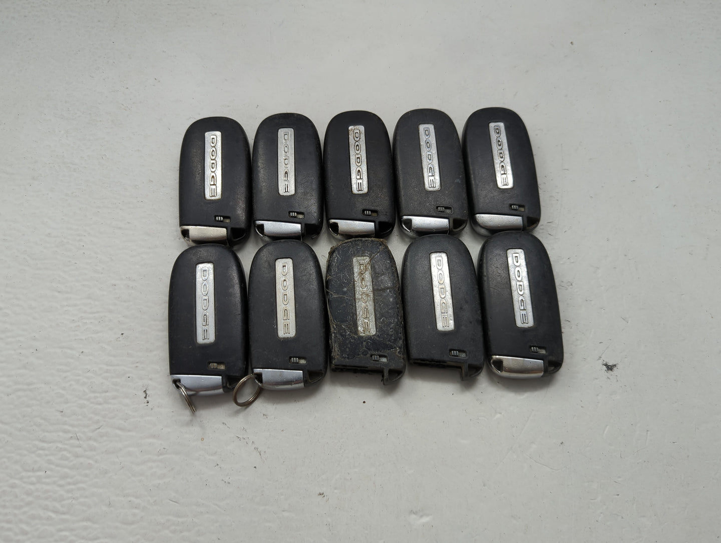 Lot of 10 Dodge Keyless Entry Remote Fob MIXED FCC IDS MIXED PART 1475818 - Oemusedautoparts1.com