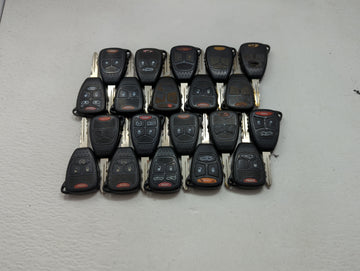 Lot of 20 Dodge Keyless Entry Remote Fob MIXED FCC IDS MIXED PART 1476534 - Oemusedautoparts1.com