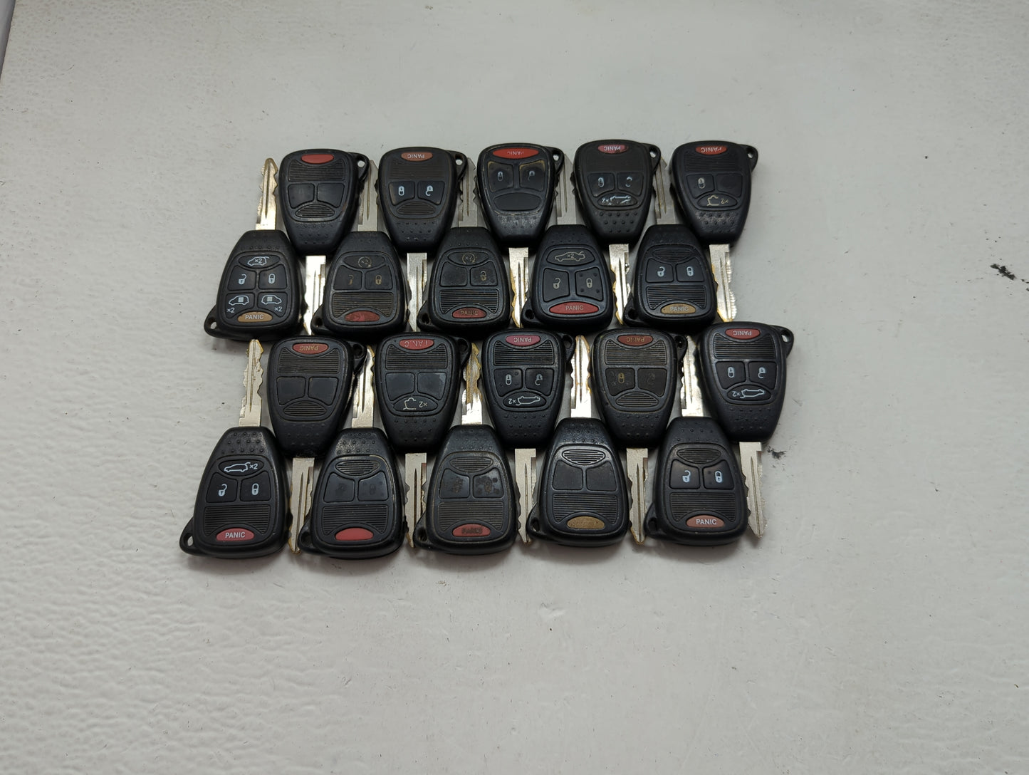 Lot of 20 Dodge Keyless Entry Remote Fob MIXED FCC IDS MIXED PART 1476549 - Oemusedautoparts1.com