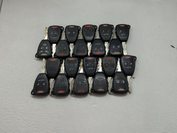 Lot of 20 Dodge Keyless Entry Remote Fob MIXED FCC IDS MIXED PART 1476549 - Oemusedautoparts1.com