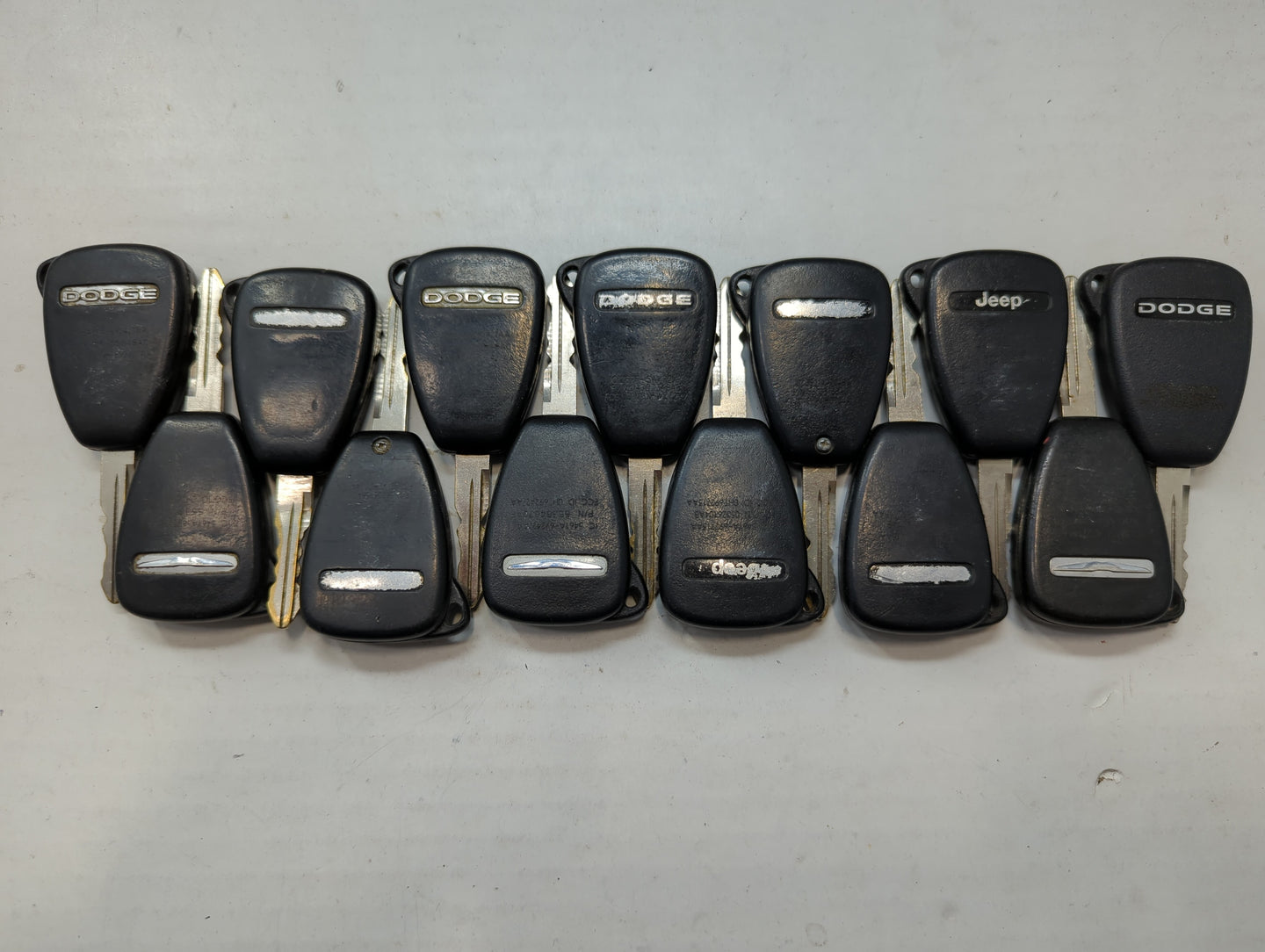 Lot of 15 Dodge Keyless Entry Remote Fob MIXED FCC IDS MIXED PART NUMBERS - Oemusedautoparts1.com