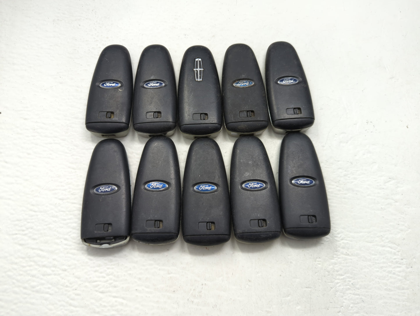 Lot of 10 Ford Keyless Entry Remote Fob MIXED FCC IDS MIXED PART NUMBERS - Oemusedautoparts1.com