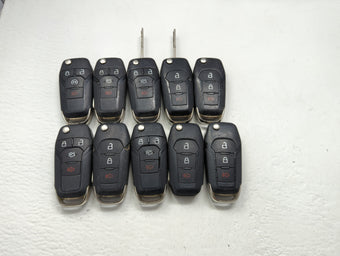 compare product Lot of 10 Ford Keyless Entry Remote Fob MIXED FCC IDS MIXED PART NUMBERS