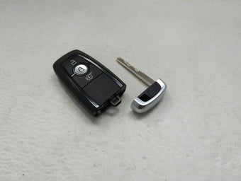 compare product Ford Keyless Entry Remote Fob A2C15011500 JL1T-15K601-DA 3 buttons