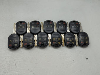 compare product Lot of 11 Ford Keyless Entry Remote Fob MIXED FCC IDS 1476219