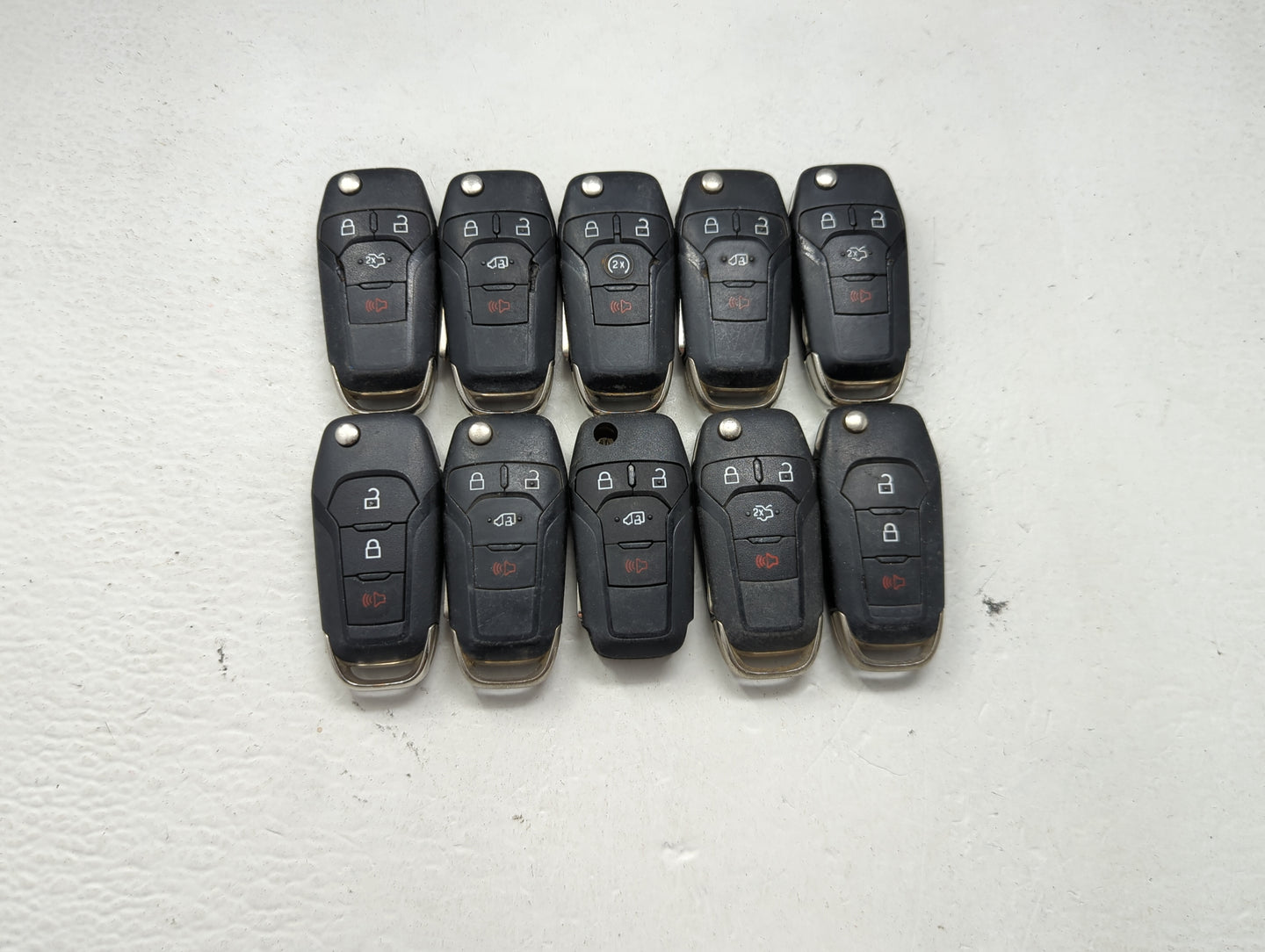 Lot of 10 Ford Keyless Entry Remote Fob MIXED FCC IDS MIXED PART NUMBERS 1476303 - Oemusedautoparts1.com