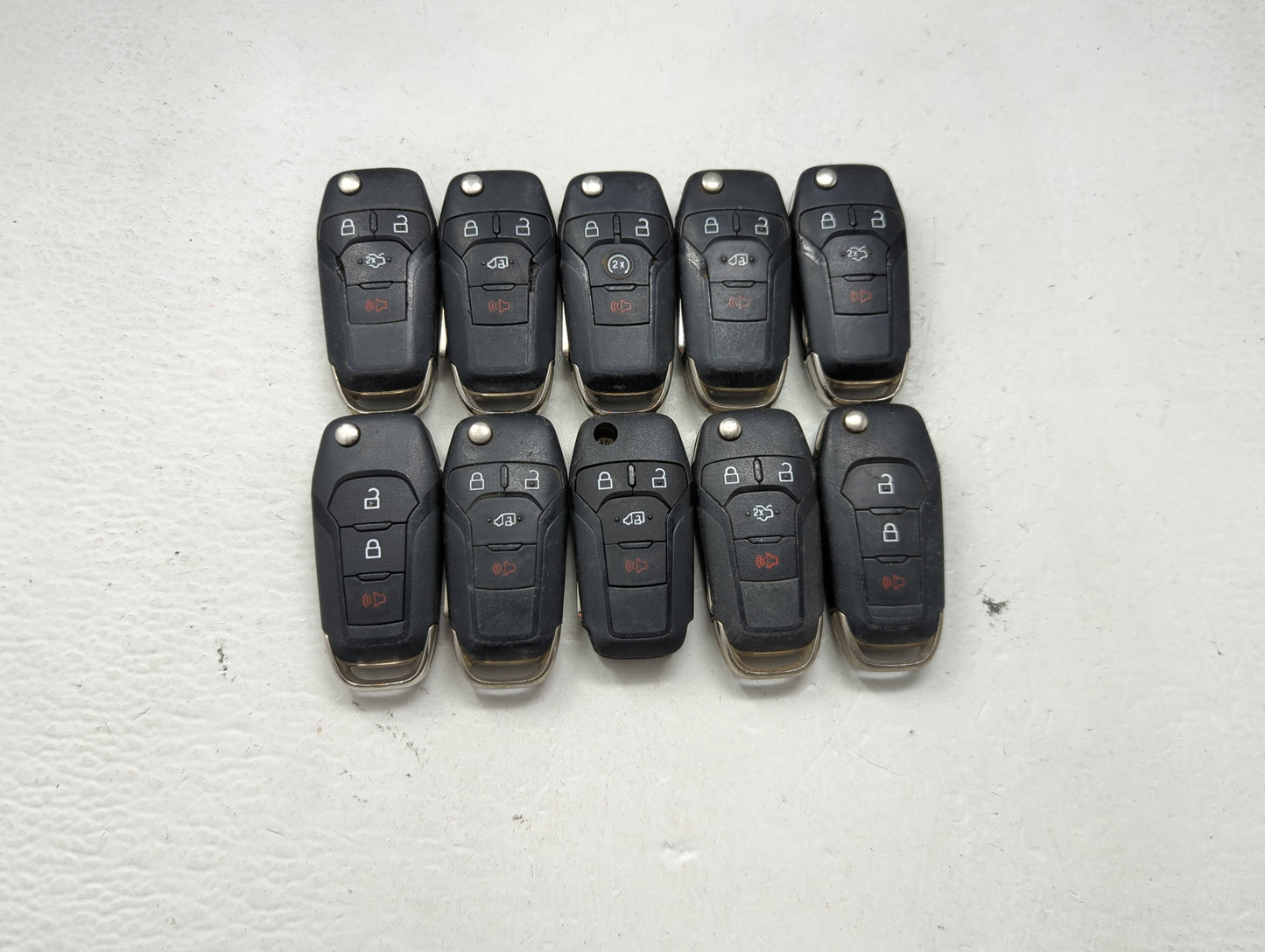Lot of 10 Ford Keyless Entry Remote Fob MIXED FCC IDS MIXED PART NUMBERS 1476303 - Oemusedautoparts1.com