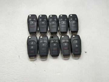 Lot of 10 Ford Keyless Entry Remote Fob MIXED FCC IDS MIXED PART NUMBERS 1476303 - Oemusedautoparts1.com