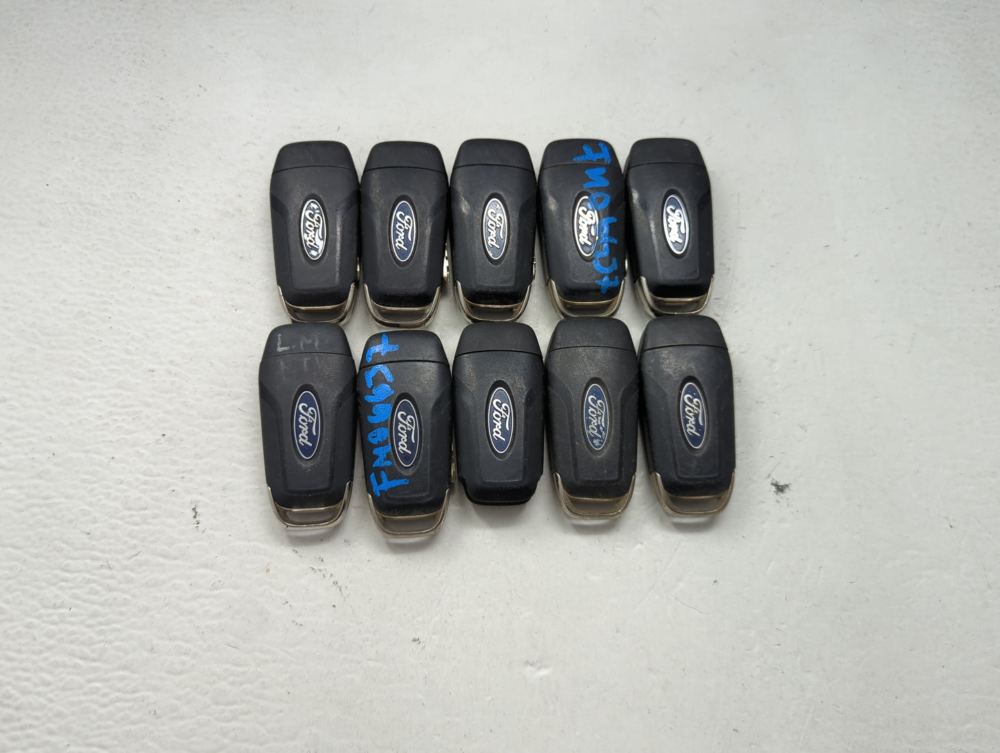 Lot of 10 Ford Keyless Entry Remote Fob MIXED FCC IDS MIXED PART NUMBERS 1476303 - Oemusedautoparts1.com