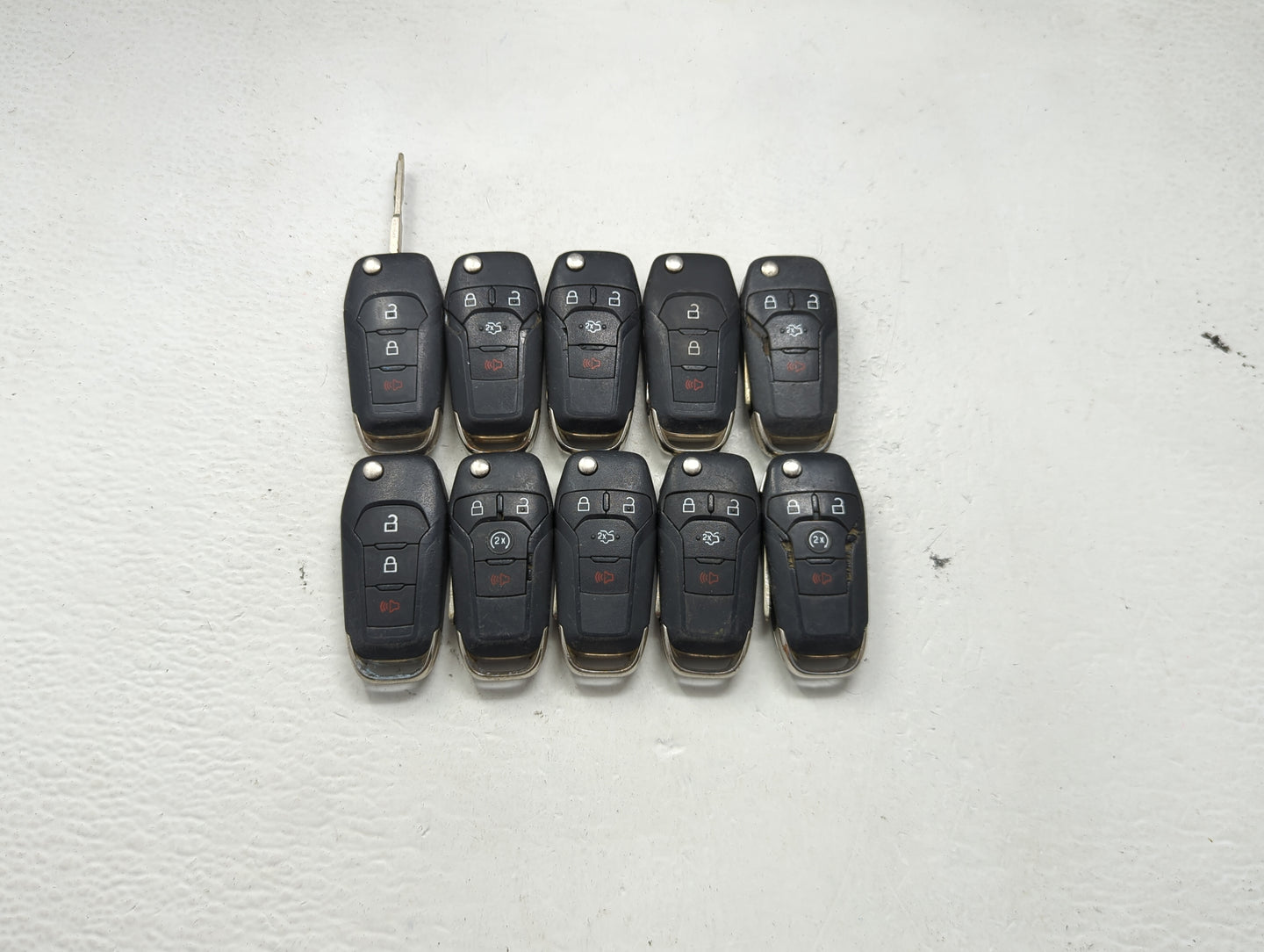 Lot of 10 Ford Keyless Entry Remote Fob MIXED FCC IDS MIXED PART NUMBERS 1476304 - Oemusedautoparts1.com