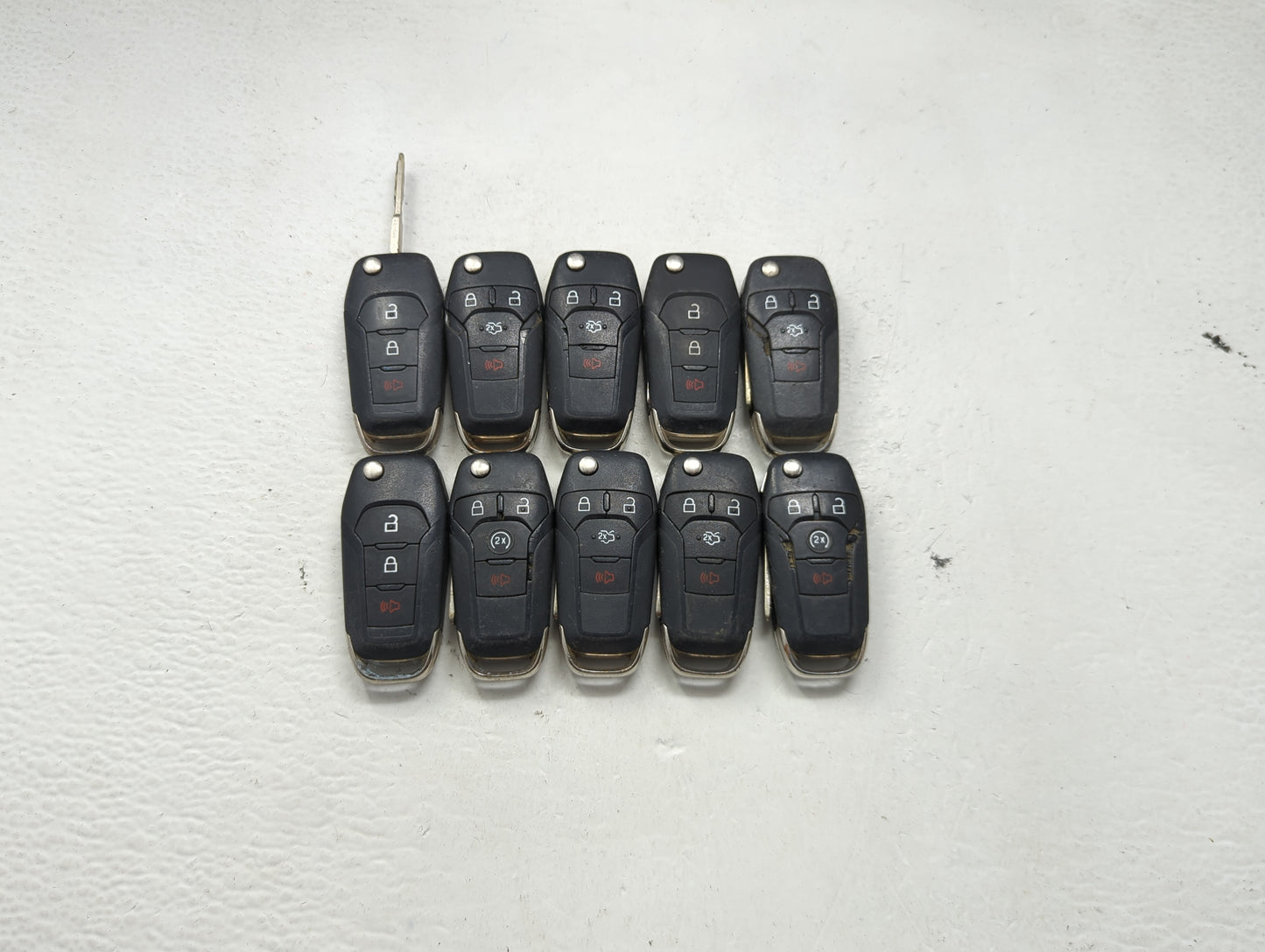 Lot of 10 Ford Keyless Entry Remote Fob MIXED FCC IDS MIXED PART NUMBERS 1476304 - Oemusedautoparts1.com