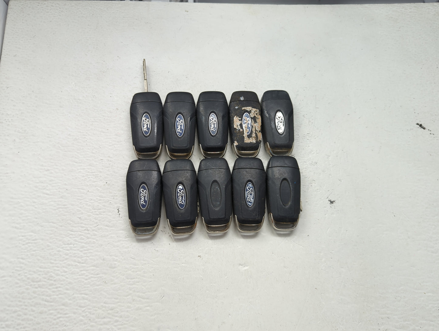 Lot of 10 Ford Keyless Entry Remote Fob MIXED FCC IDS MIXED PART NUMBERS 1476304 - Oemusedautoparts1.com