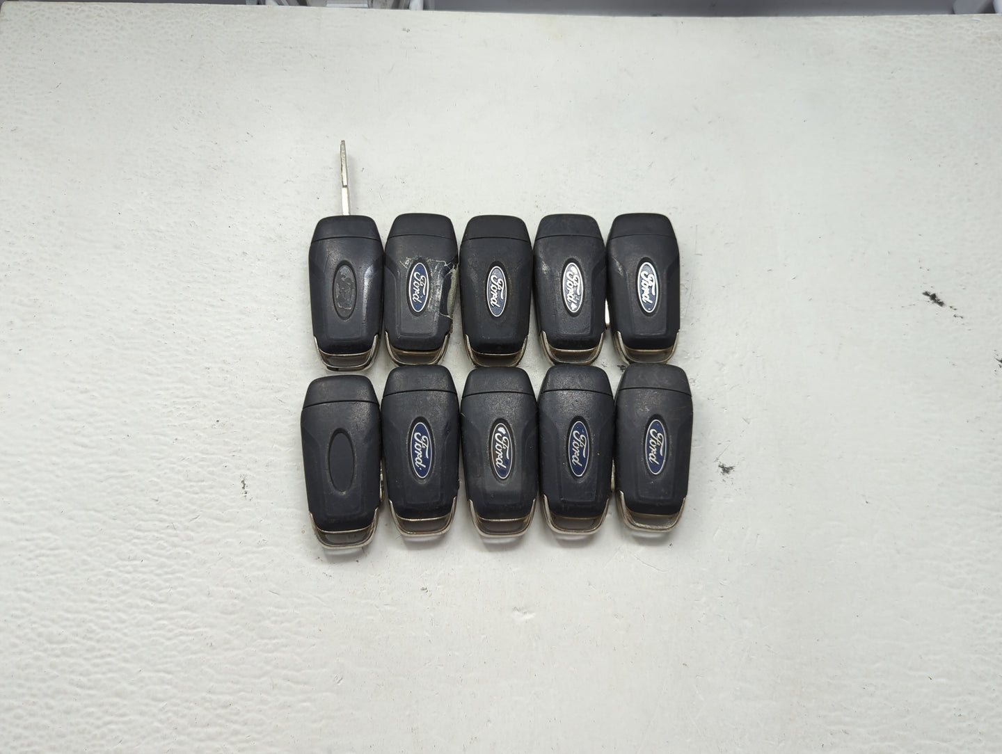 Lot of 10 Ford Keyless Entry Remote Fob MIXED FCC IDS MIXED PART NUMBERS 1476305 - Oemusedautoparts1.com