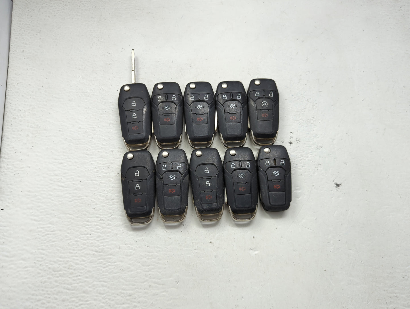 Lot of 10 Ford Keyless Entry Remote Fob MIXED FCC IDS MIXED PART NUMBERS 1476306 - Oemusedautoparts1.com