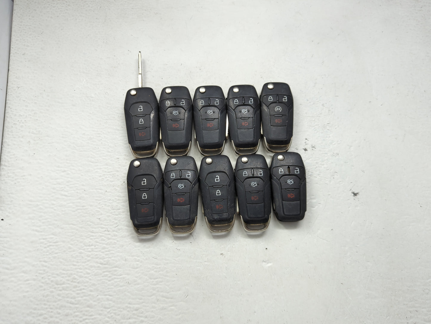 Lot of 10 Ford Keyless Entry Remote Fob MIXED FCC IDS MIXED PART NUMBERS 1476306 - Oemusedautoparts1.com