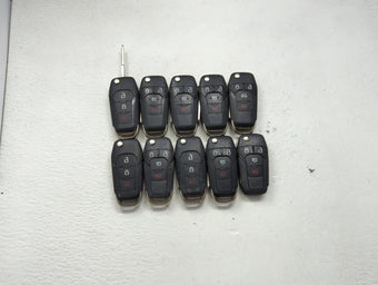 compare product Lot of 10 Ford Keyless Entry Remote Fob MIXED FCC IDS MIXED PART NUMBERS 1476306