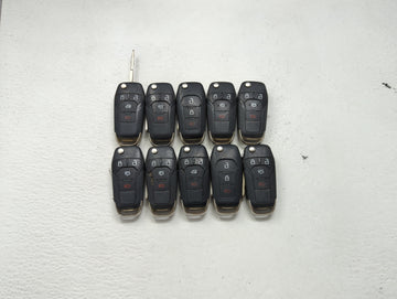 Lot of 10 Ford Keyless Entry Remote Fob MIXED FCC IDS MIXED PART NUMBERS 1476312 - Oemusedautoparts1.com