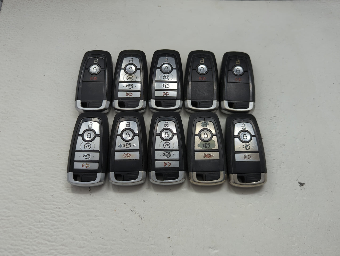 Lot of 10 Ford Keyless Entry Remote Fob MIXED FCC IDS MIXED PART NUMBERS 1476363 - Oemusedautoparts1.com