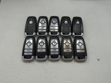 Lot of 10 Ford Keyless Entry Remote Fob MIXED FCC IDS MIXED PART NUMBERS 1476363 - Oemusedautoparts1.com