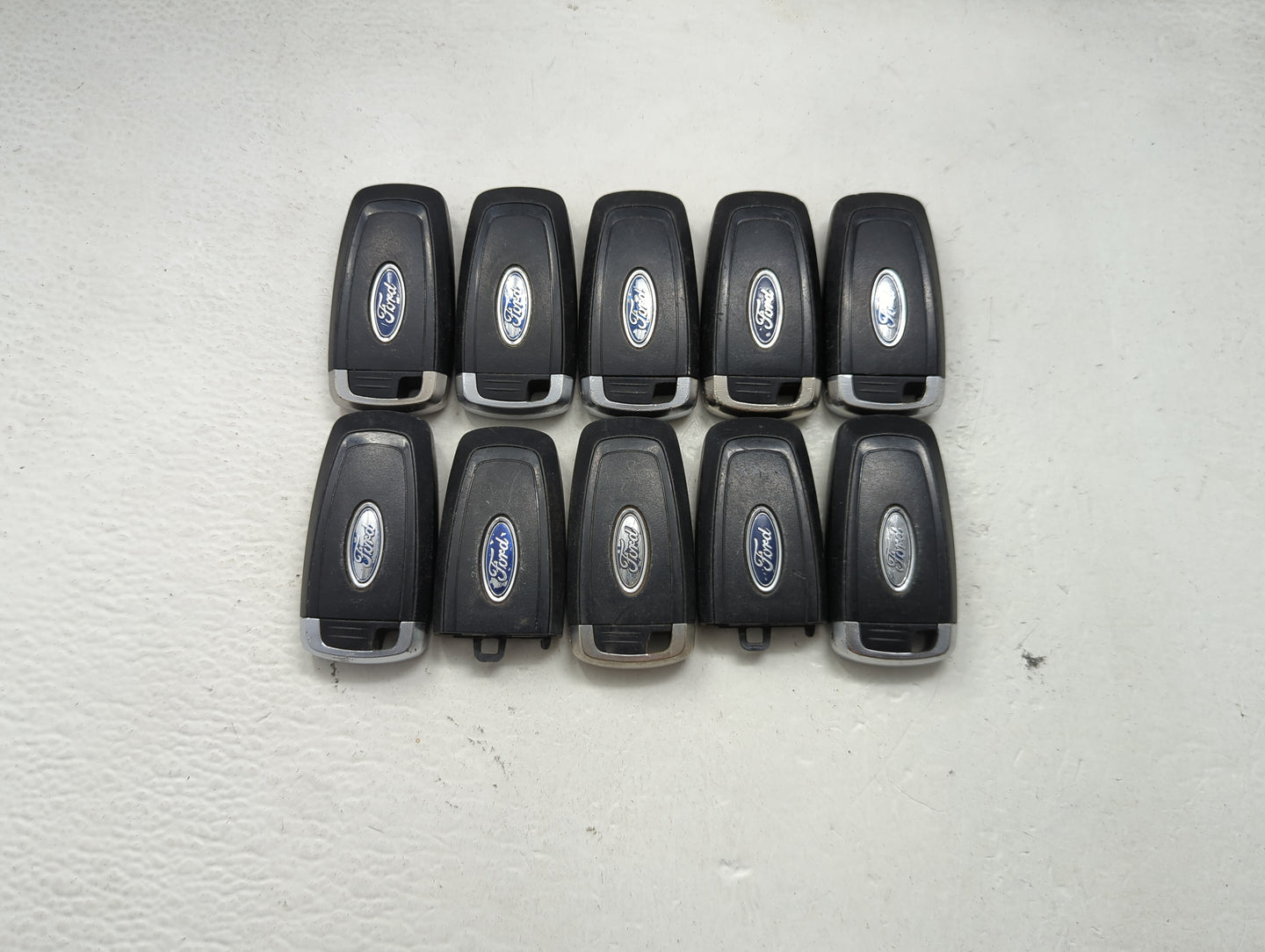 Lot of 10 Ford Keyless Entry Remote Fob MIXED FCC IDS MIXED PART NUMBERS 1476365 - Oemusedautoparts1.com