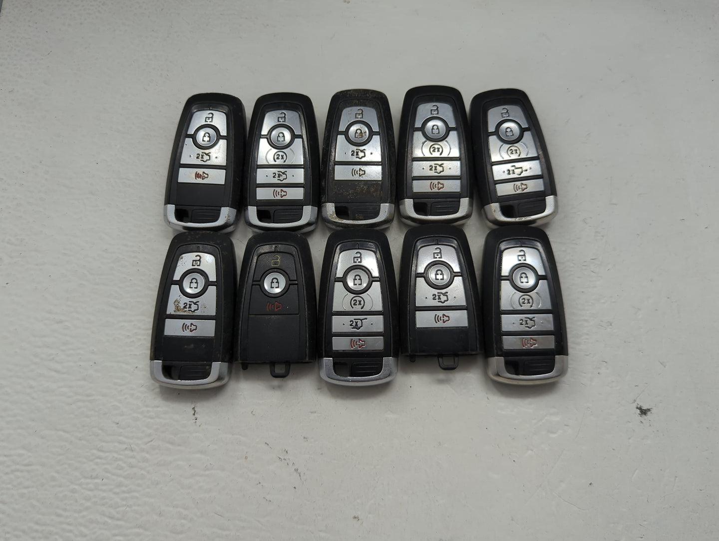 Lot of 10 Ford Keyless Entry Remote Fob MIXED FCC IDS MIXED PART NUMBERS 1476366 - Oemusedautoparts1.com