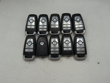 Lot of 10 Ford Keyless Entry Remote Fob MIXED FCC IDS MIXED PART NUMBERS 1476366 - Oemusedautoparts1.com