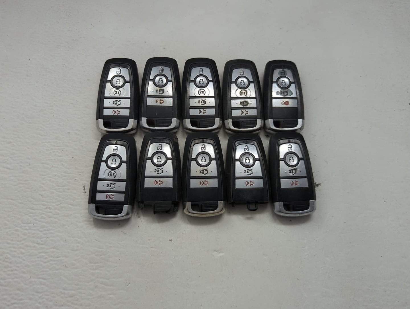 Lot of 10 Ford Keyless Entry Remote Fob MIXED FCC IDS MIXED PART NUMBERS 1476367 - Oemusedautoparts1.com