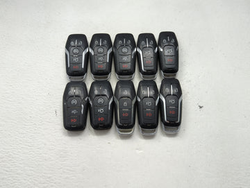 Lot of 10 Ford Keyless Entry Remote Fob MIXED FCC IDS MIXED PART NUMBERS 1476380 - Oemusedautoparts1.com