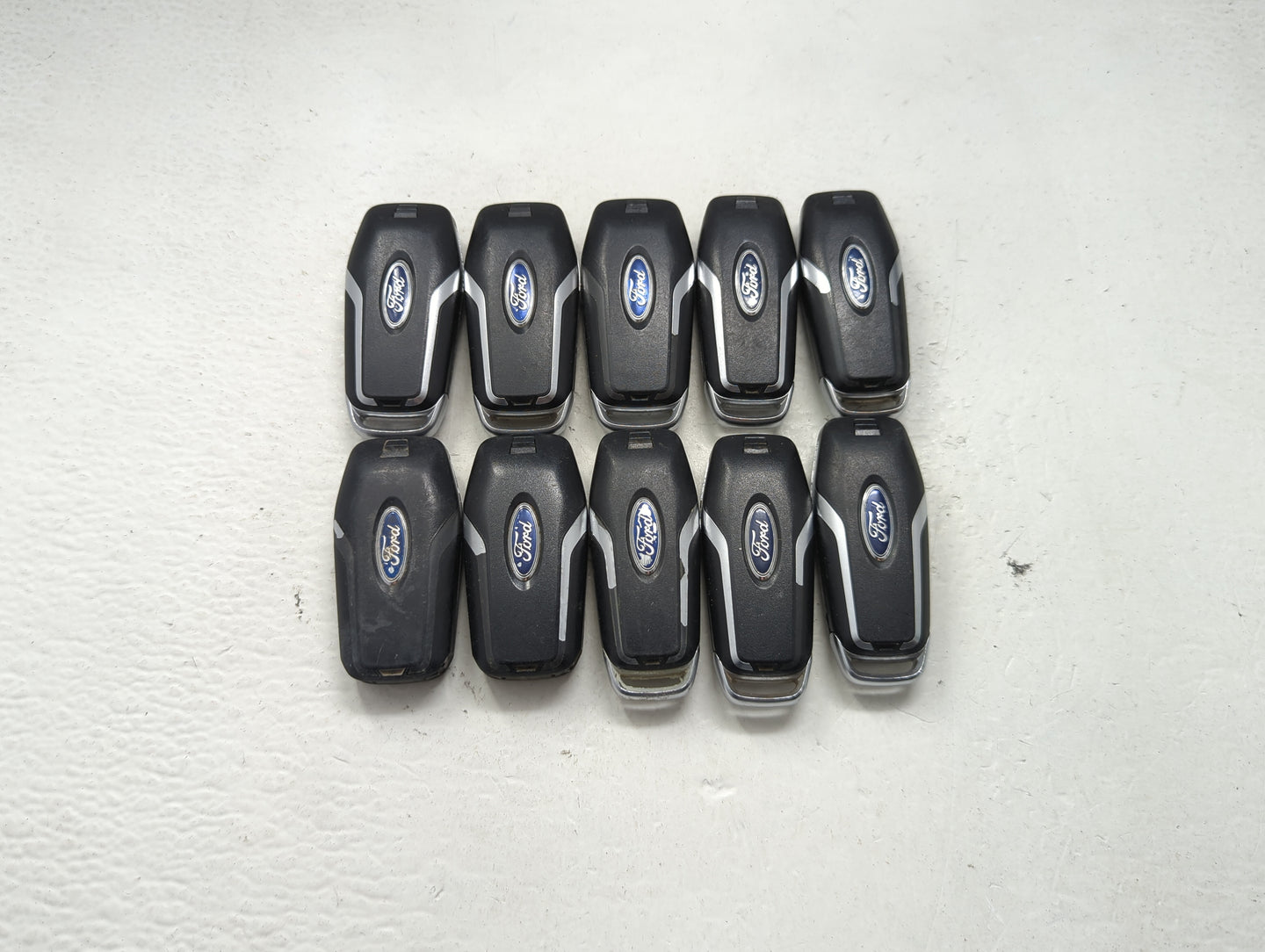 Lot of 10 Ford Keyless Entry Remote Fob MIXED FCC IDS MIXED PART NUMBERS 1476380 - Oemusedautoparts1.com