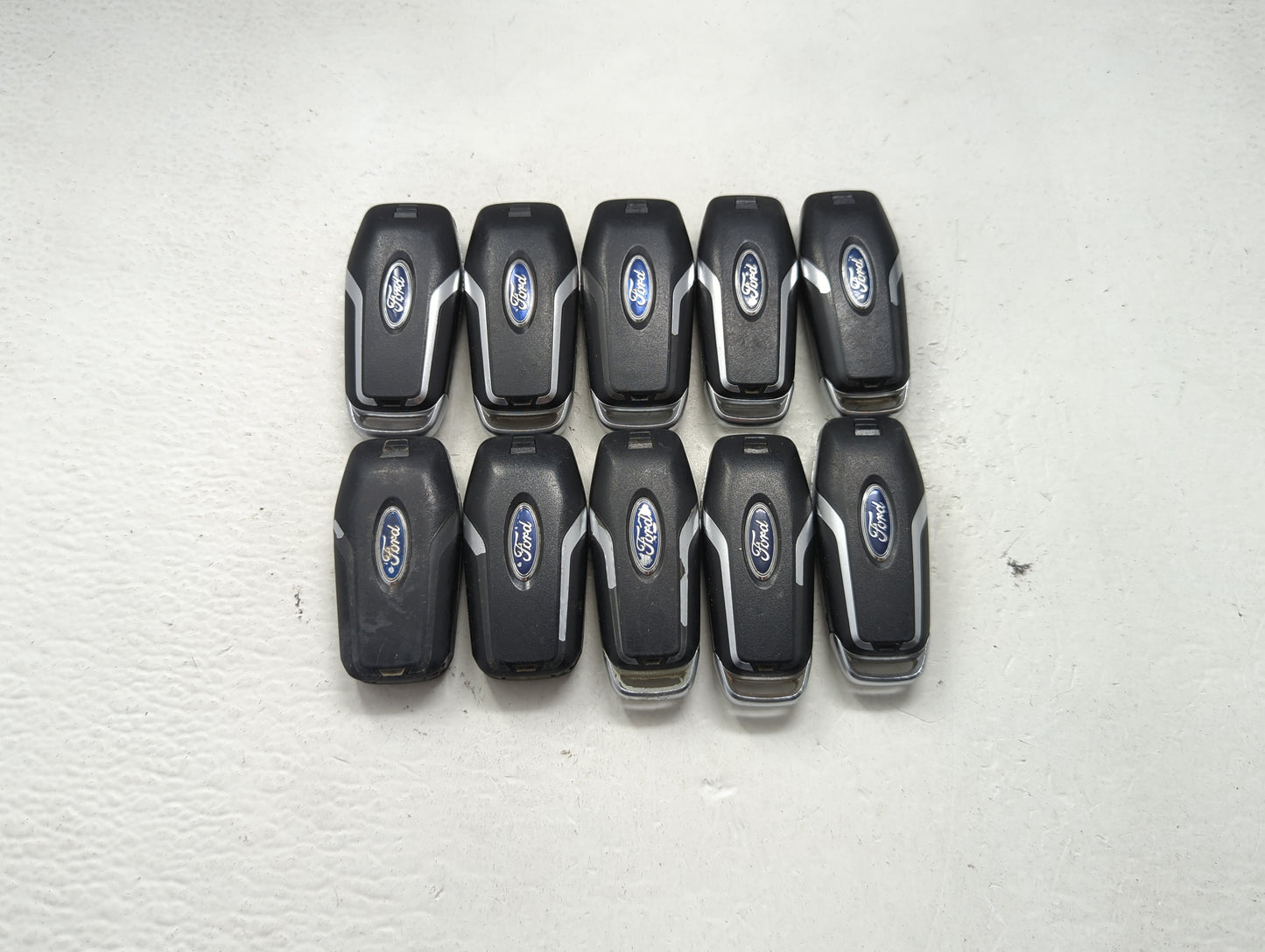 Lot of 10 Ford Keyless Entry Remote Fob MIXED FCC IDS MIXED PART NUMBERS 1476380 - Oemusedautoparts1.com