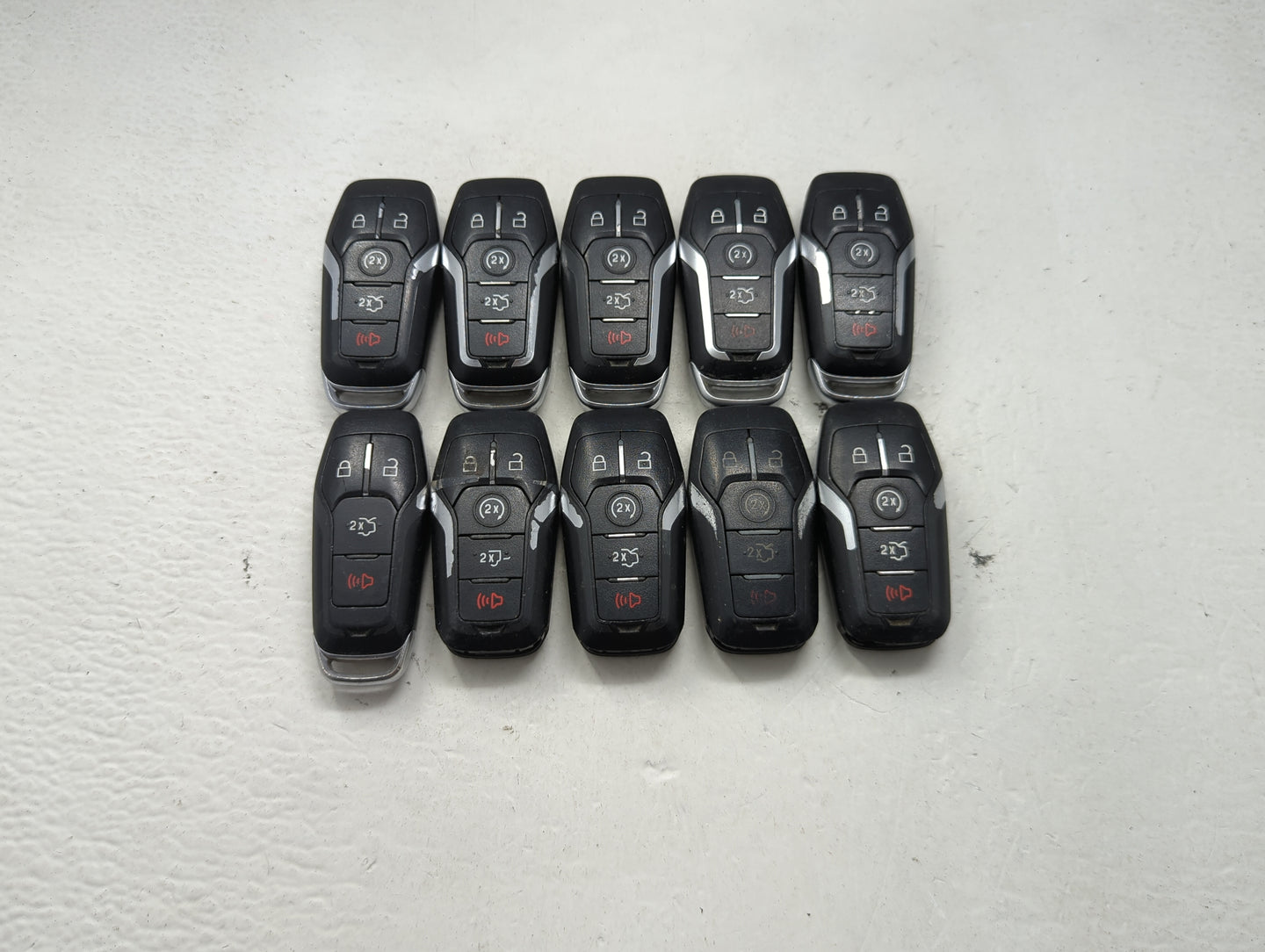 Lot of 10 Ford Keyless Entry Remote Fob MIXED FCC IDS MIXED PART NUMBERS 1476400 - Oemusedautoparts1.com