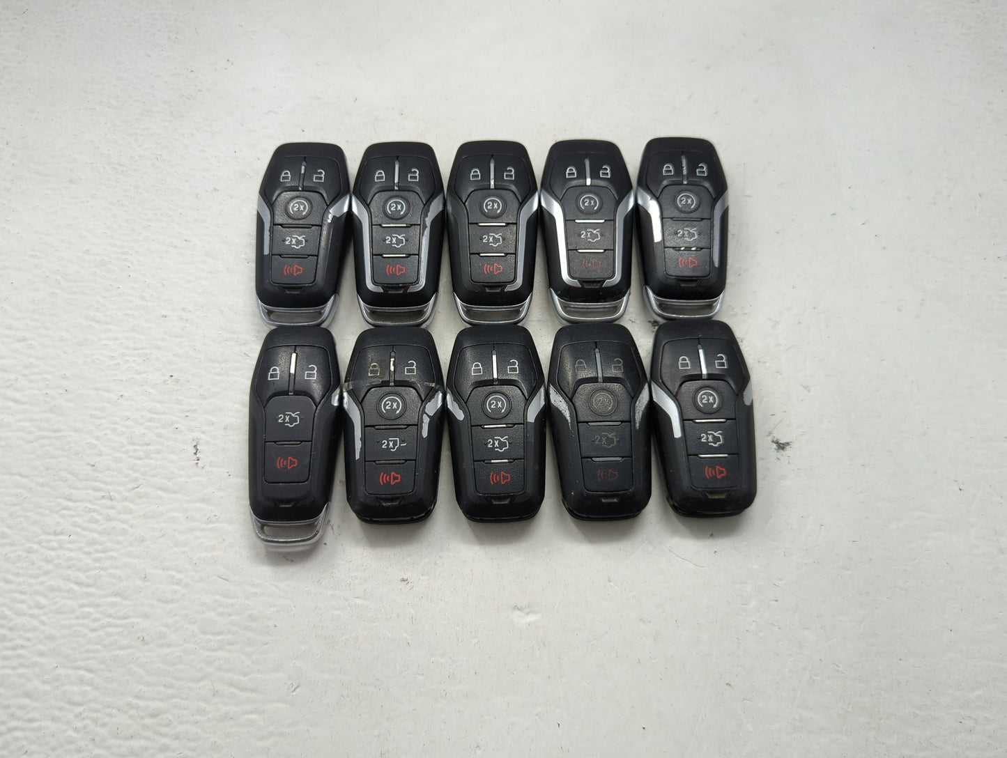 Lot of 10 Ford Keyless Entry Remote Fob MIXED FCC IDS MIXED PART NUMBERS 1476400 - Oemusedautoparts1.com