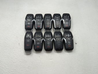 compare product Lot of 10 Ford Keyless Entry Remote Fob MIXED FCC IDS MIXED PART NUMBERS 1476400
