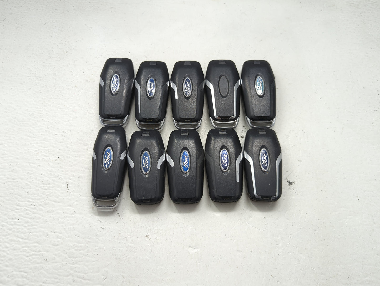 Lot of 10 Ford Keyless Entry Remote Fob MIXED FCC IDS MIXED PART NUMBERS 1476400 - Oemusedautoparts1.com