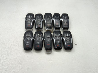compare product Lot of 10 Ford Keyless Entry Remote Fob MIXED FCC IDS MIXED PART NUMBERS 1476401