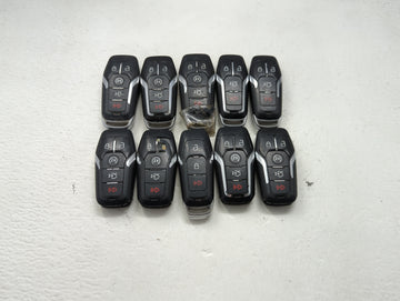 Lot of 10 Ford Keyless Entry Remote Fob MIXED FCC IDS MIXED PART NUMBERS 1476401 - Oemusedautoparts1.com