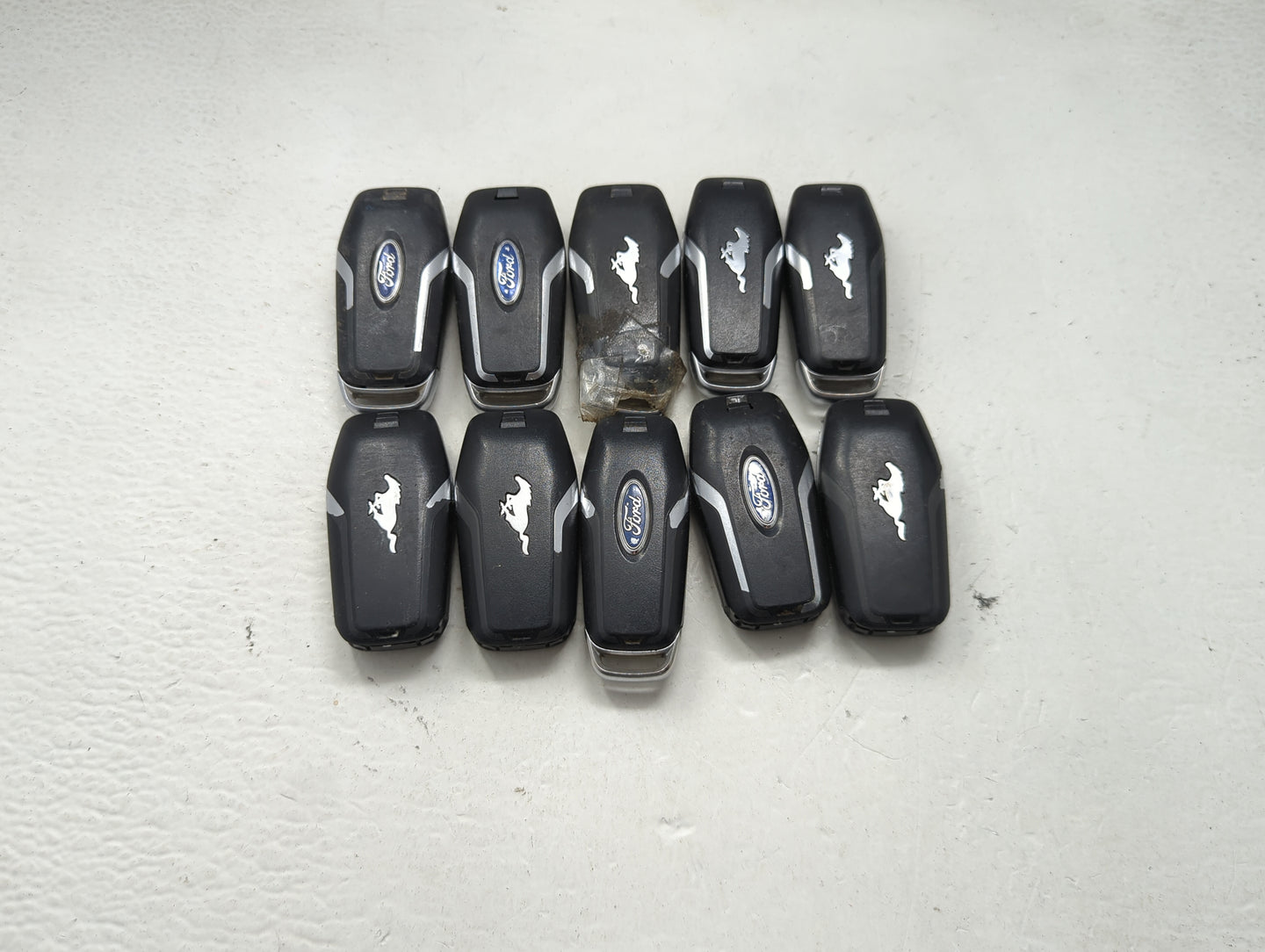 Lot of 10 Ford Keyless Entry Remote Fob MIXED FCC IDS MIXED PART NUMBERS 1476401 - Oemusedautoparts1.com