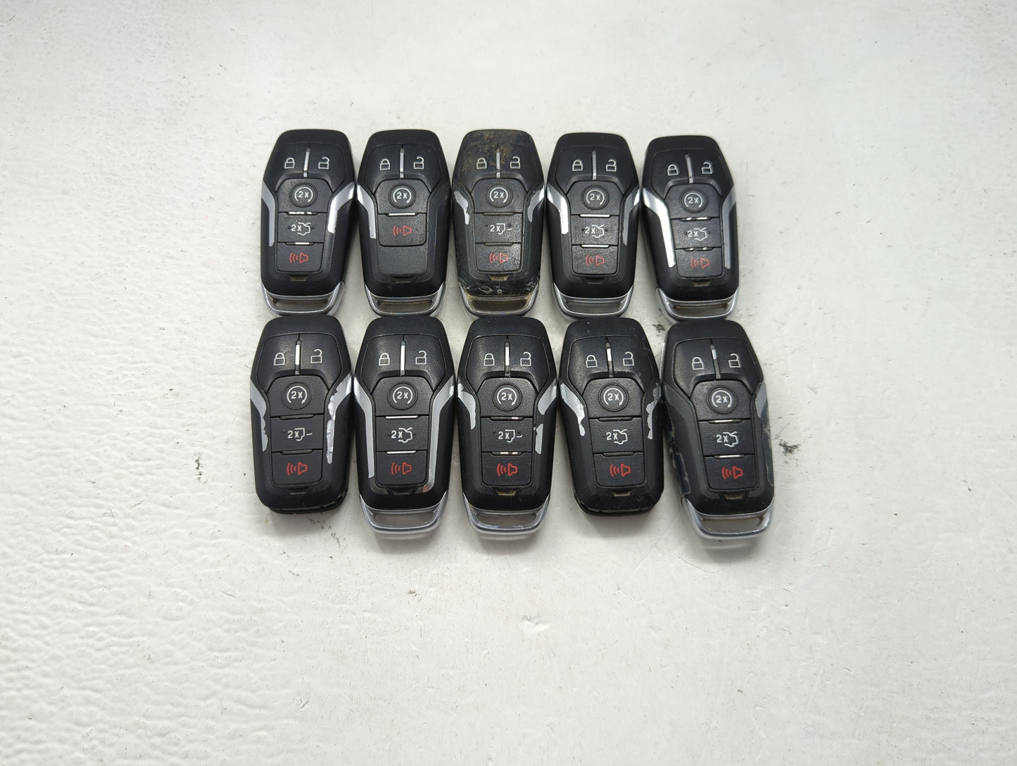 Lot of 10 Ford Keyless Entry Remote Fob MIXED FCC IDS MIXED PART NUMBERS 1476402 - Oemusedautoparts1.com