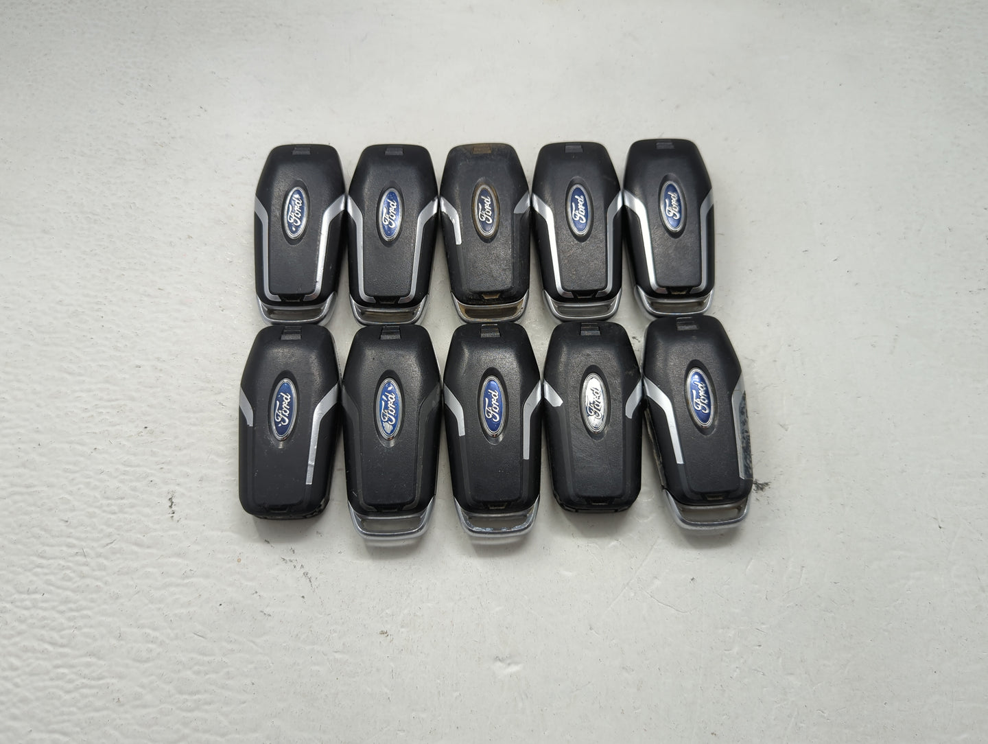 Lot of 10 Ford Keyless Entry Remote Fob MIXED FCC IDS MIXED PART NUMBERS 1476402 - Oemusedautoparts1.com