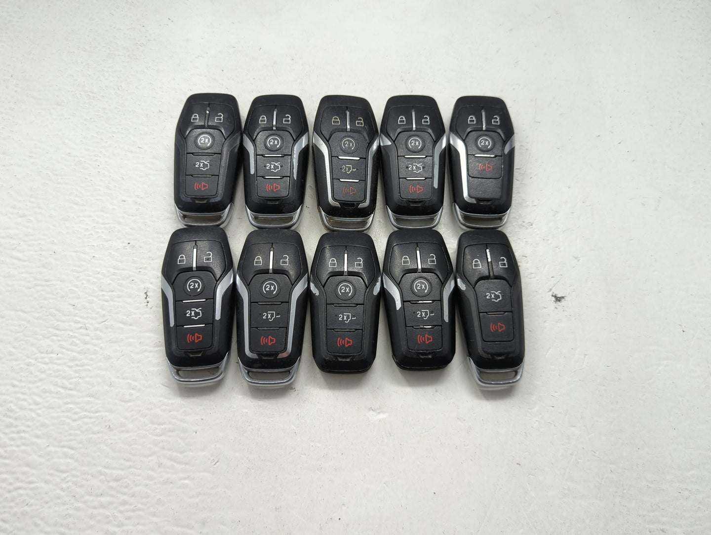 Lot of 10 Ford Keyless Entry Remote Fob MIXED FCC IDS MIXED PART NUMBERS 1476403 - Oemusedautoparts1.com