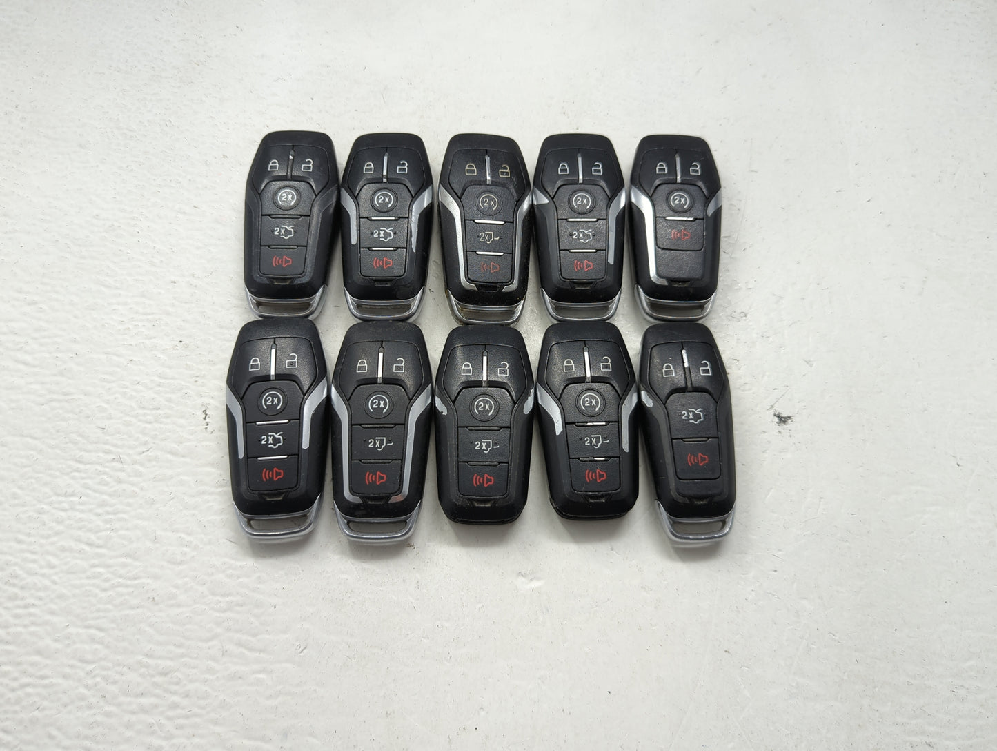 Lot of 10 Ford Keyless Entry Remote Fob MIXED FCC IDS MIXED PART NUMBERS 1476403 - Oemusedautoparts1.com