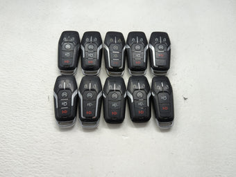 compare product Lot of 10 Ford Keyless Entry Remote Fob MIXED FCC IDS MIXED PART NUMBERS 1476403