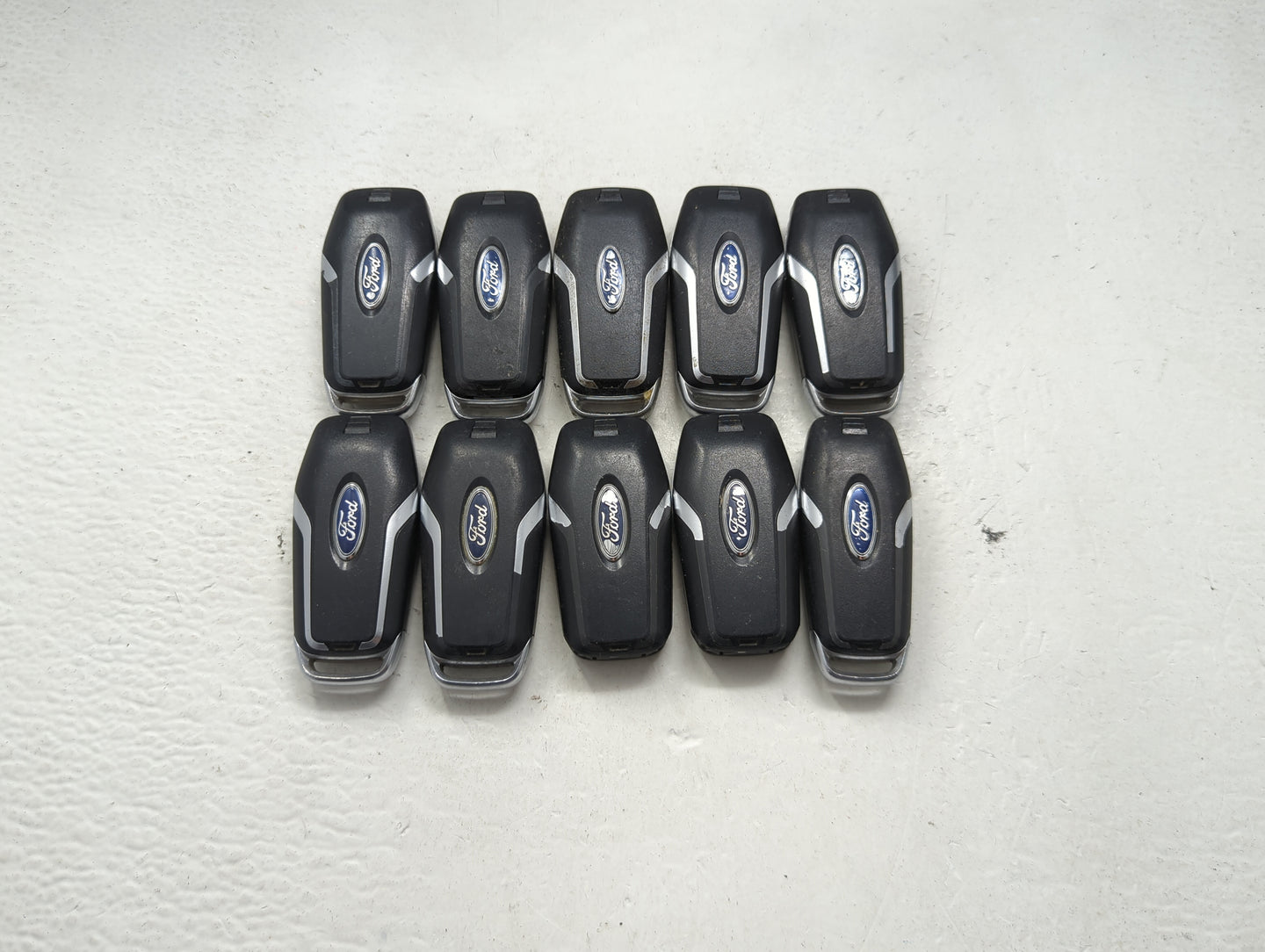 Lot of 10 Ford Keyless Entry Remote Fob MIXED FCC IDS MIXED PART NUMBERS 1476403 - Oemusedautoparts1.com